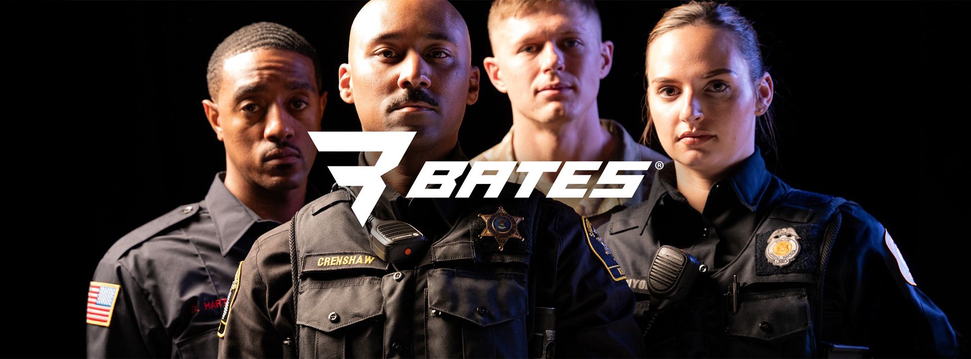 Bates by Wolverine Hero Image - Men and Women Police Officers in uniform standing in front of a black background